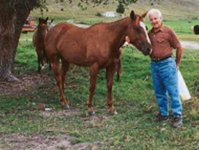 Uncle John with horse on the ranch